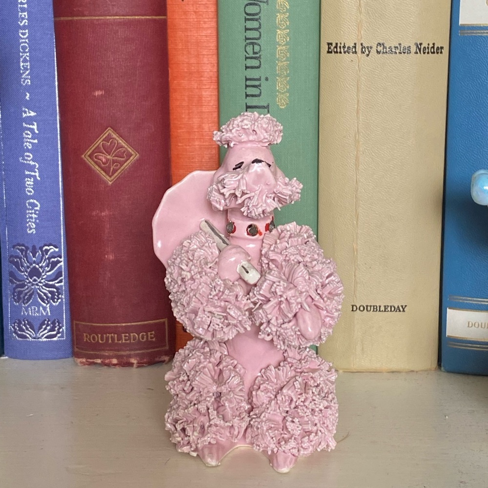 Vintage pink spaghetti poodle with umbrella